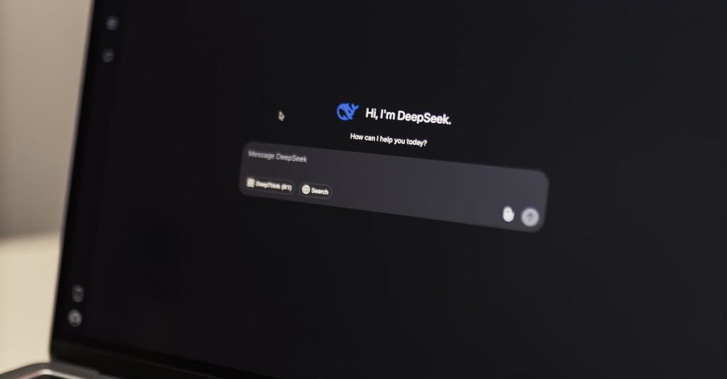 Close-up view of an AI chat interface on a laptop screen in a dimly lit room.